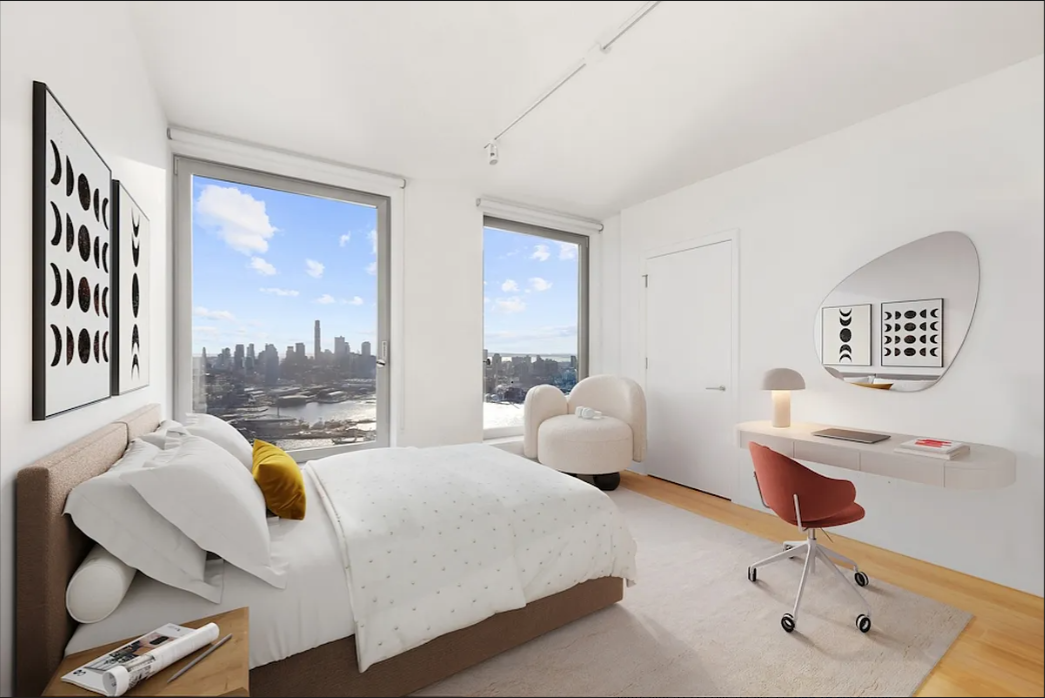 5 South 5th Street, Unit 5300 Brooklyn, NY 11249 - Photo 10 of 28 a bedroom with a large bed and a large window