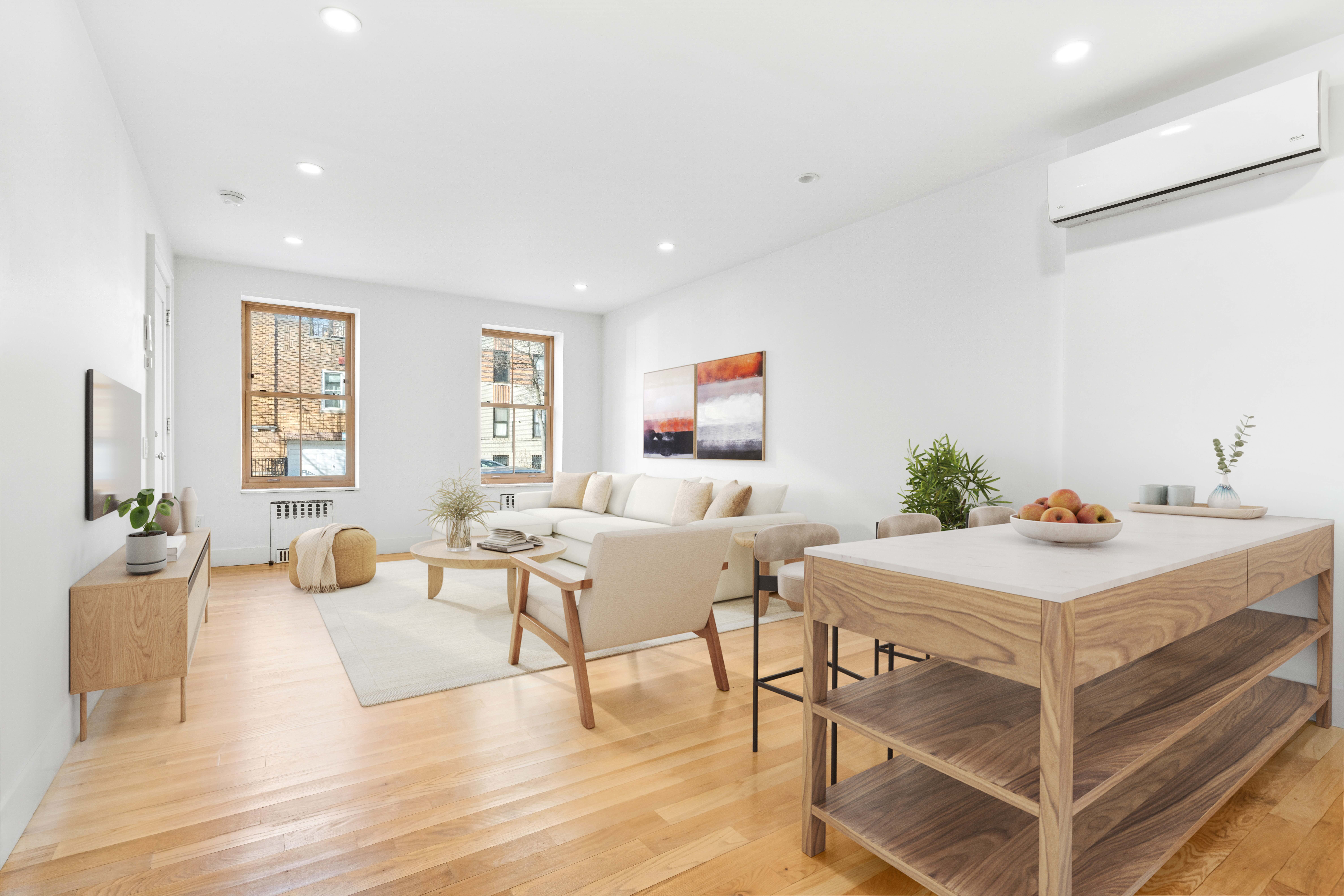 1515 11th Avenue, Unit 1 Brooklyn, NY 11215 - Photo 1 of 11 a living room with furniture and wooden floor