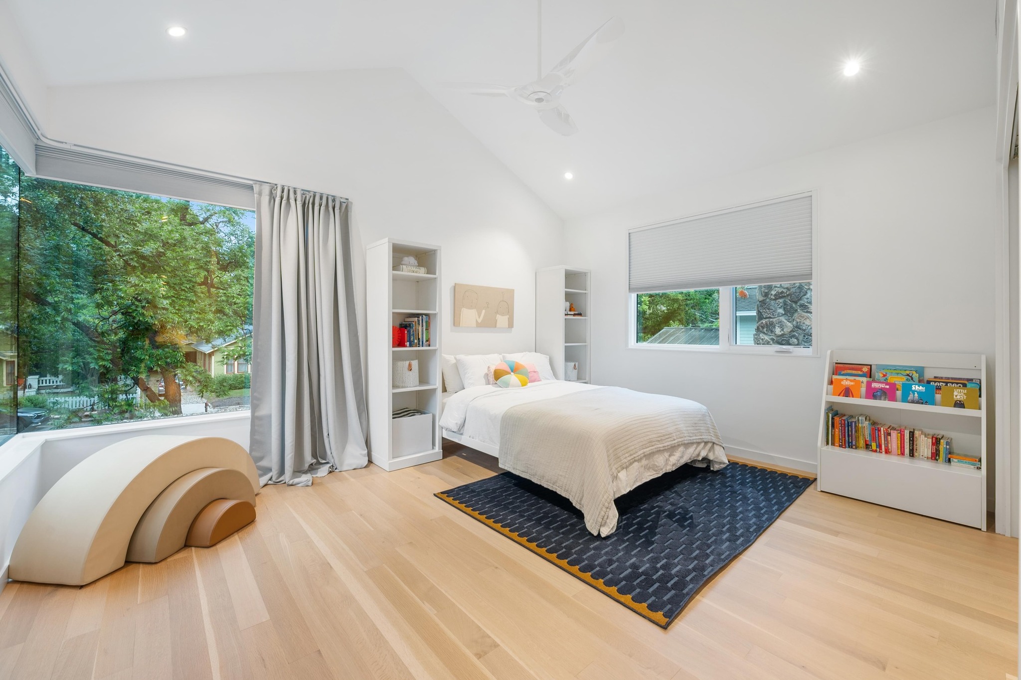 1206 Bickler Road Austin, TX 78704 - Photo 48 of 65 a bedroom with a large bed and a window