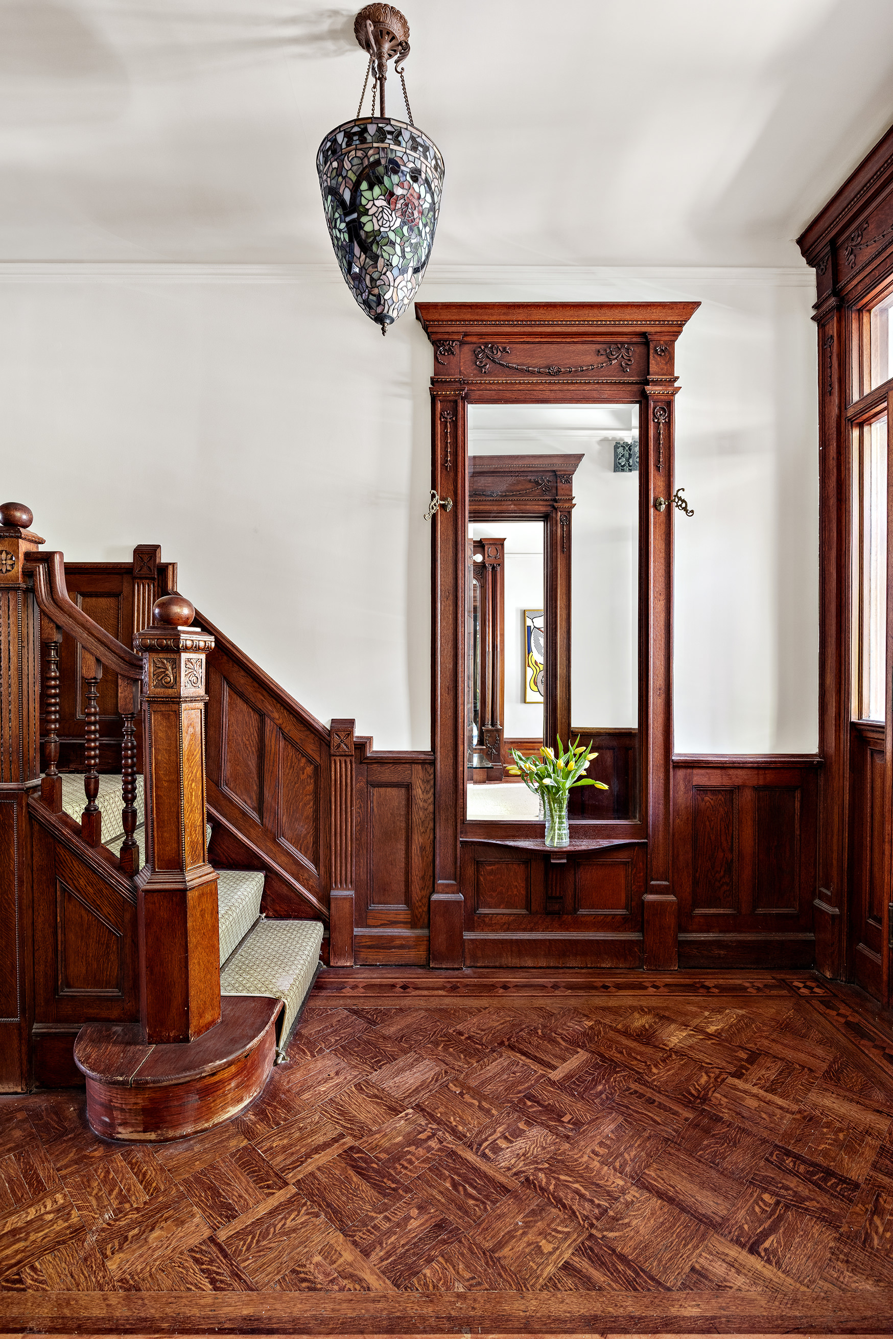 608 2nd Street Brooklyn, NY 11215 - Photo 3 of 34 a view of staircase with a table and a chandelier