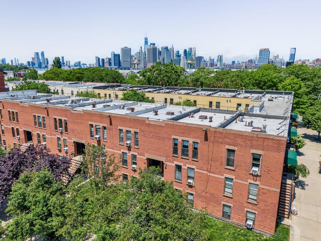 57 Carroll Street, Unit 38A Brooklyn, NY 11231 - Photo 20 of 21 a view of a city with tall buildings