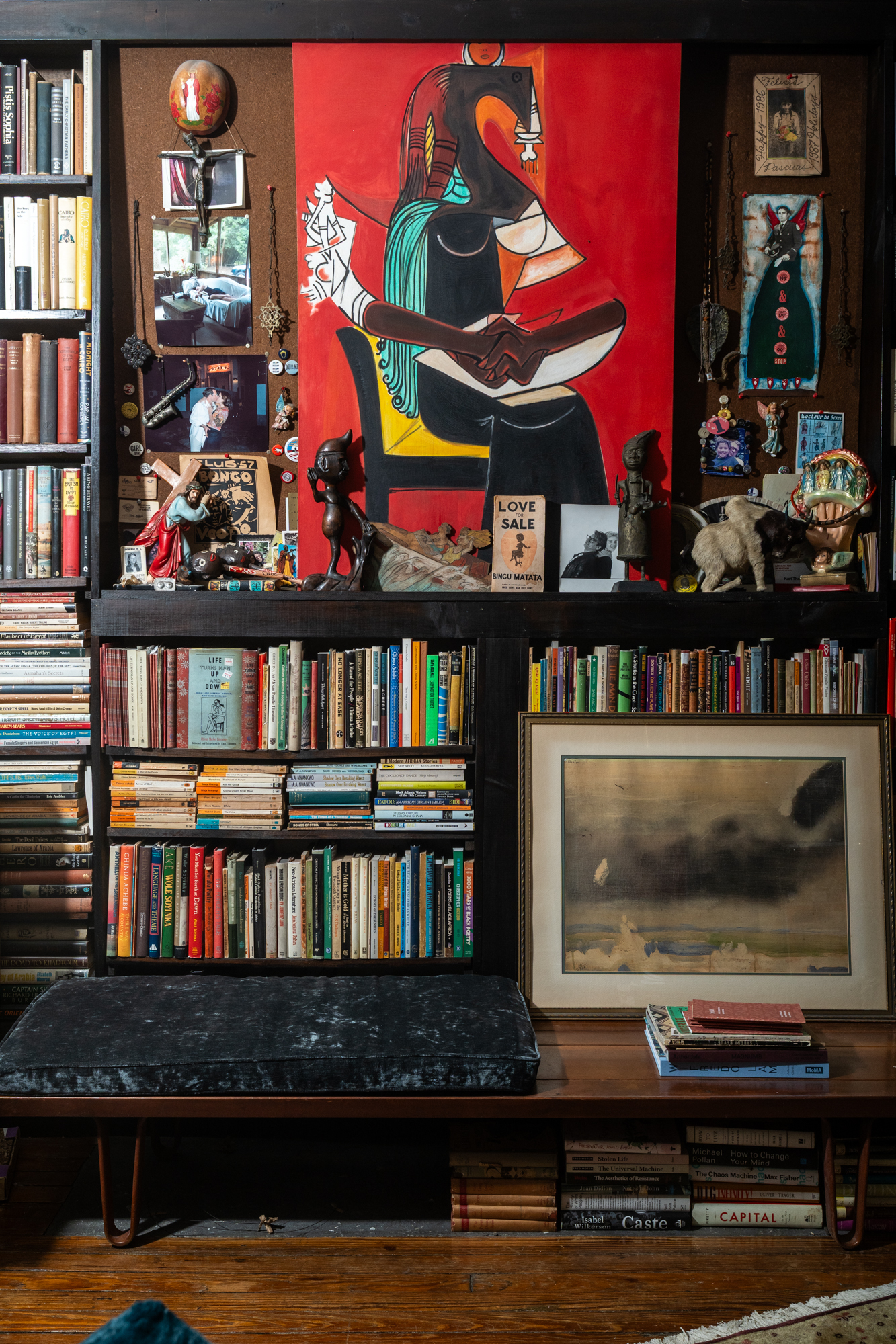 426 West 160th Street Manhattan, NY 10032 - Photo 12 of 33 a living room with lots of books and a book shelf