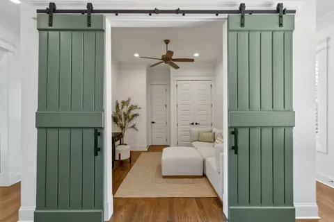 a view of a chair and table in the balcony