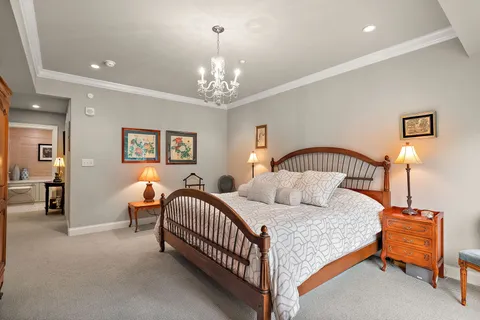 a bedroom with bed and window