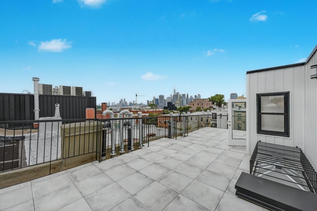 109 President Street, Unit 4 Brooklyn, NY 11231 - Photo 18 of 22 a balcony with an outdoor space