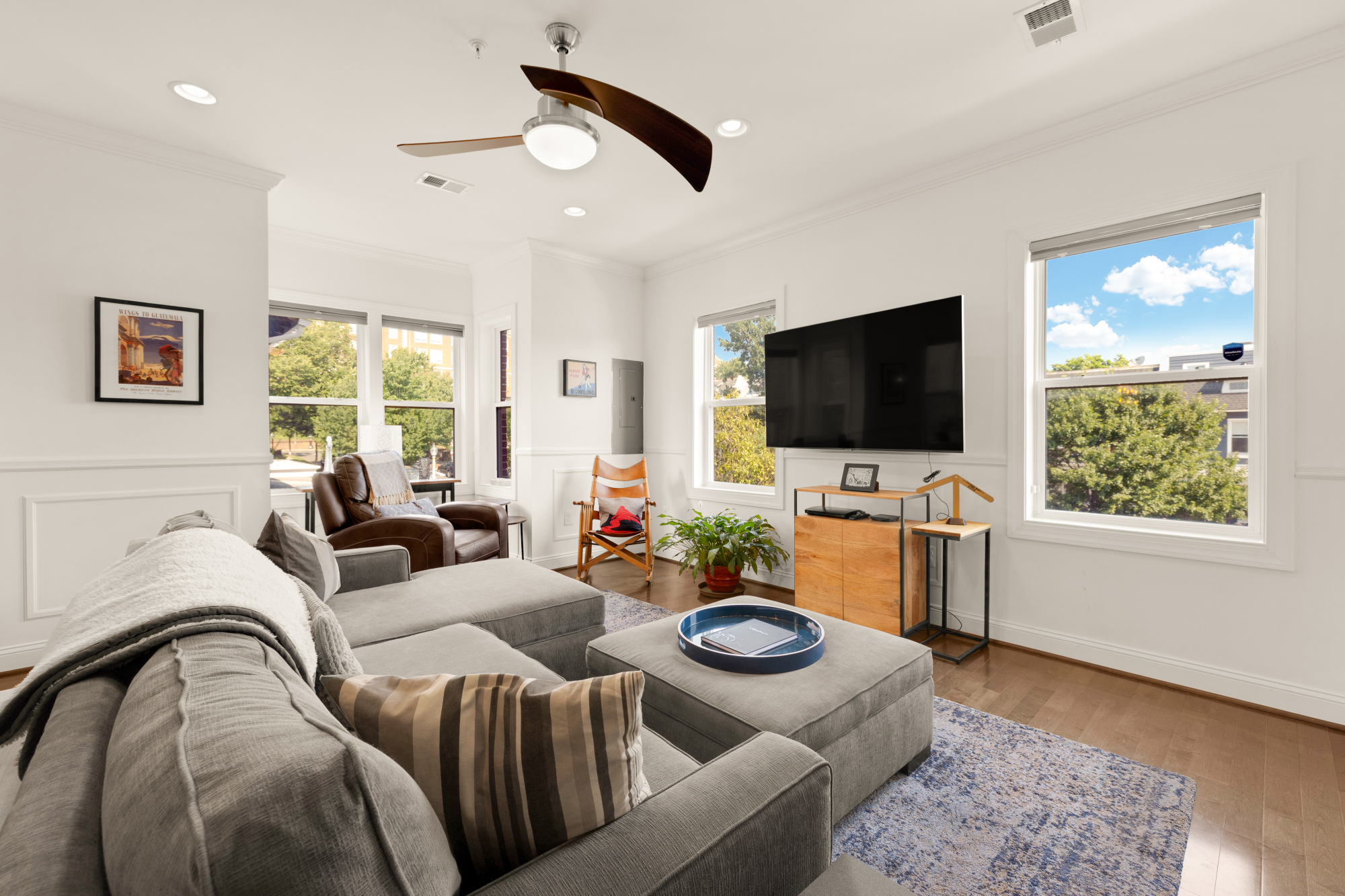 233 S Street Northeast, Unit 4 Washington, DC 20002 - Photo 7 of 37 a living room with furniture and a flat screen tv