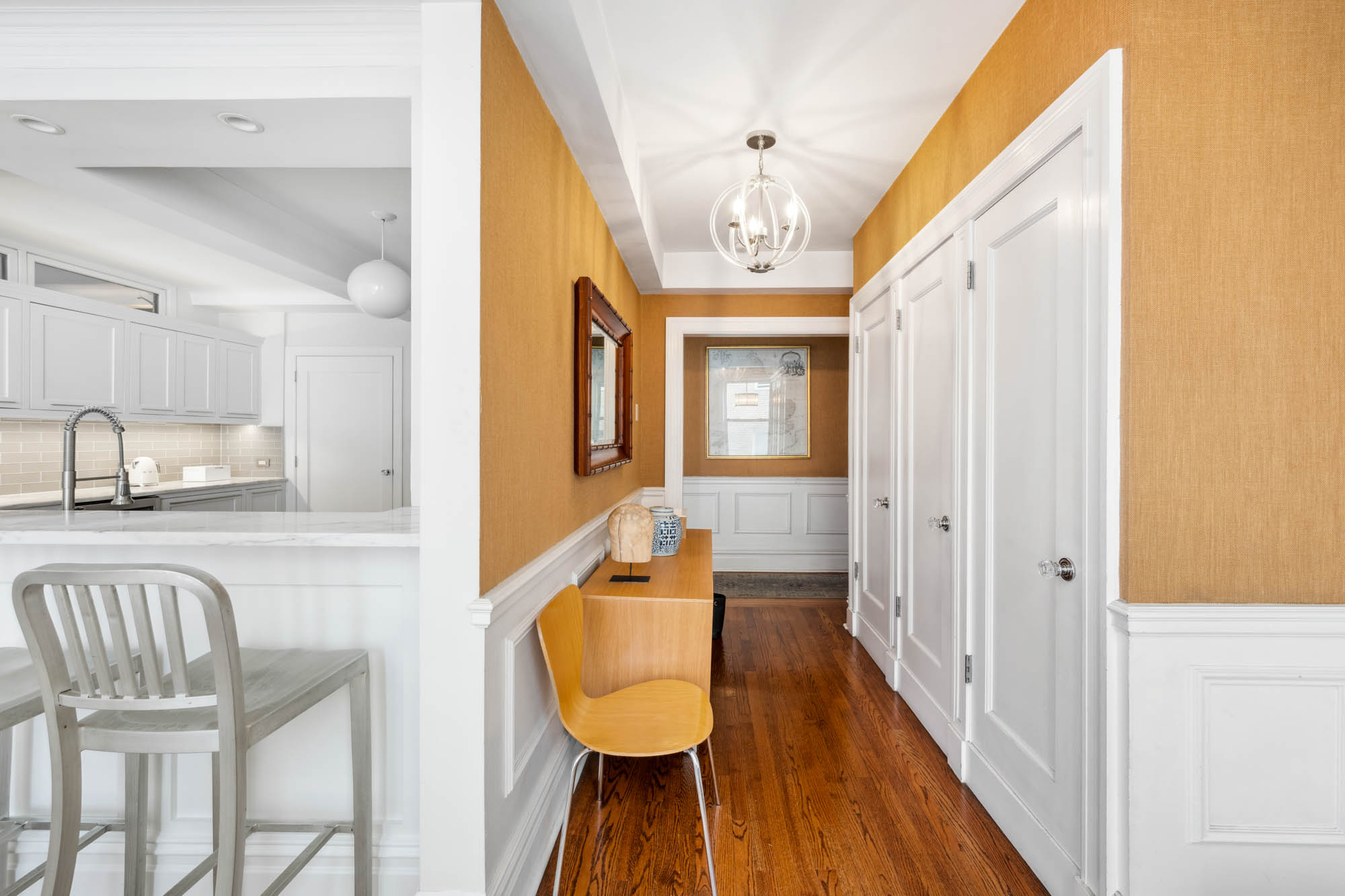 136 East 36th Street, Unit 9/10C Manhattan, NY 10016 - Photo 7 of 23 a bathroom with a sink and a mirror
