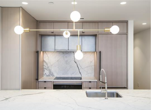 318 West 52nd Street, Unit 3C Manhattan, NY 10019 - Photo 5 of 6 a bathroom with a sink and a mirror