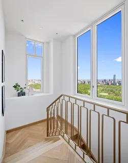 a view of porch with wooden floor