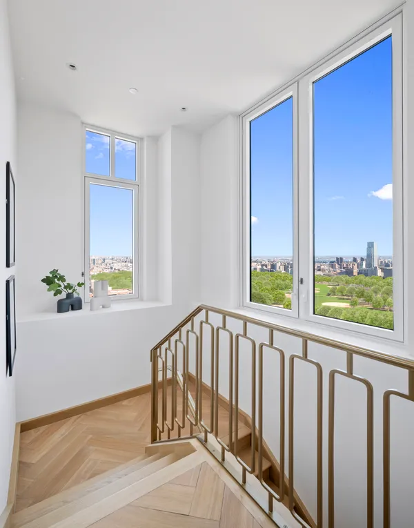 a view of porch with wooden floor