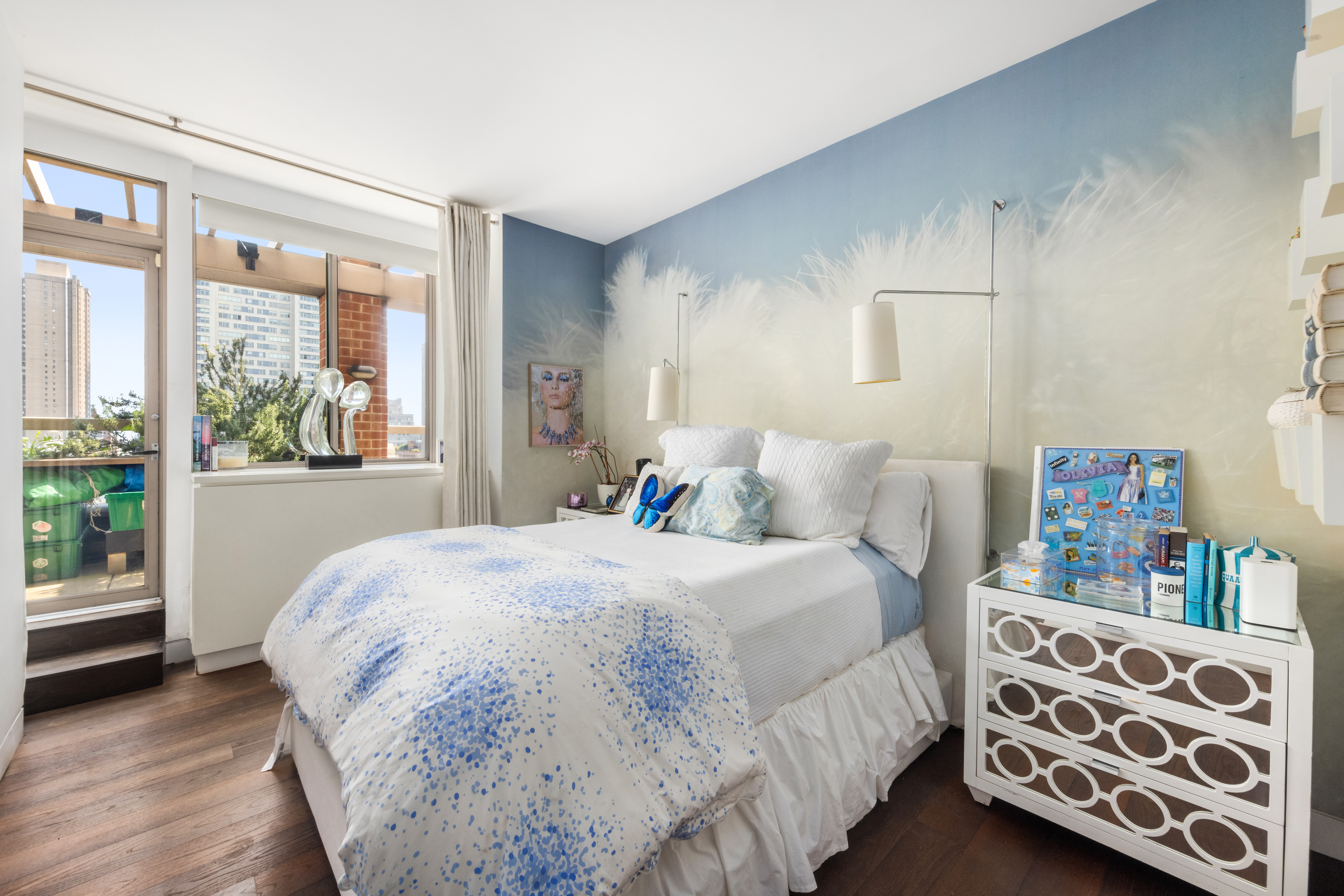 350 East 82nd Street, Unit 14AB Manhattan, NY 10028 - Photo 15 of 21 a bedroom with a bed next to a window