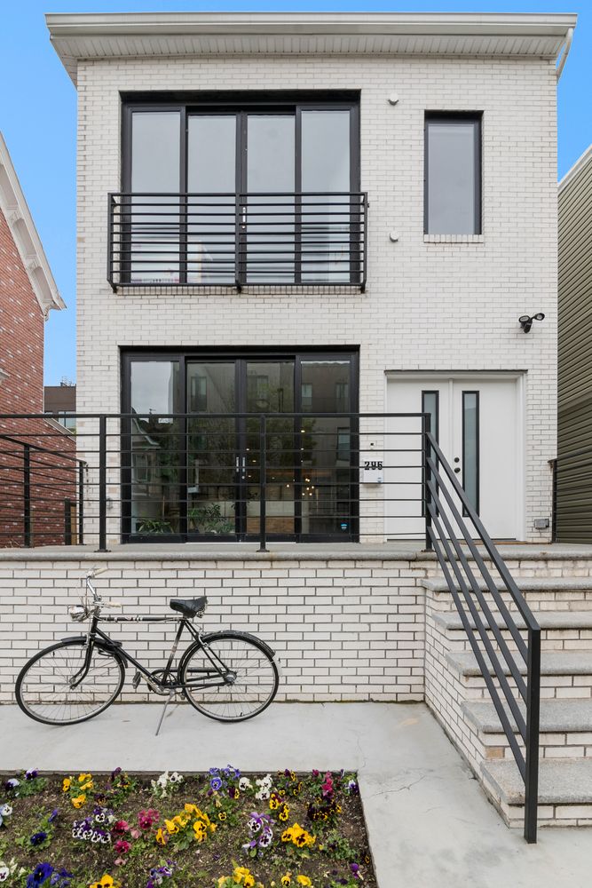 a bathroom with a sink and a window