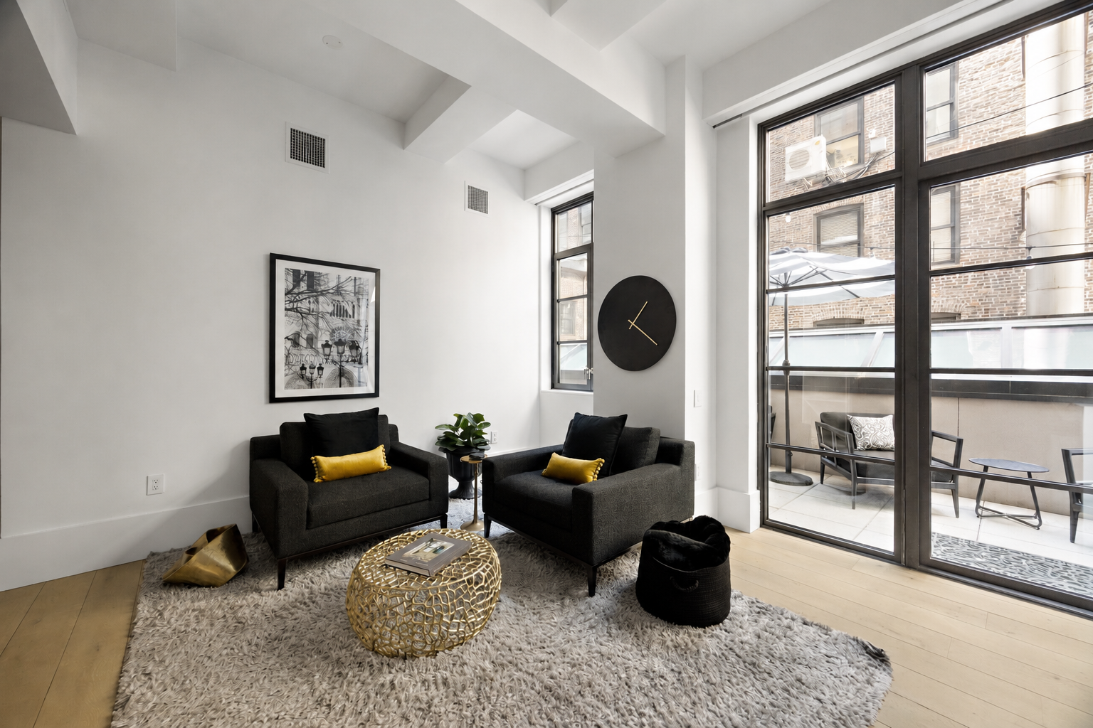 404 Park Avenue South, Unit 3E Manhattan, NY 10016 - Photo 6 of 21 a living room with furniture and a floor to ceiling window