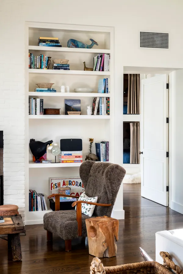 a bedroom with bed and a flat tv screen