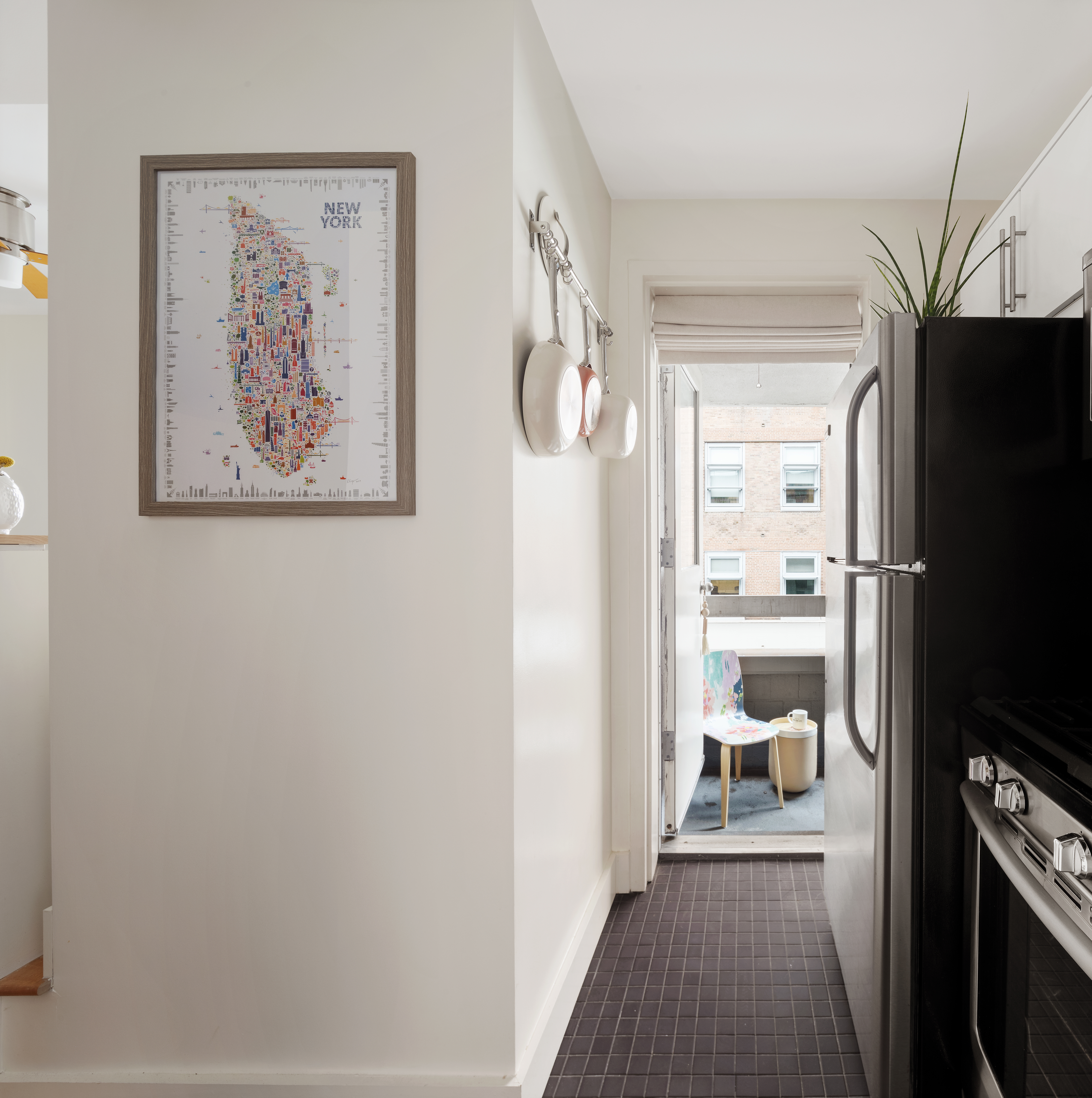 85 8th Avenue, Unit 5H Manhattan, NY 10011 - Photo 5 of 7 a view of a bedroom from a hallway