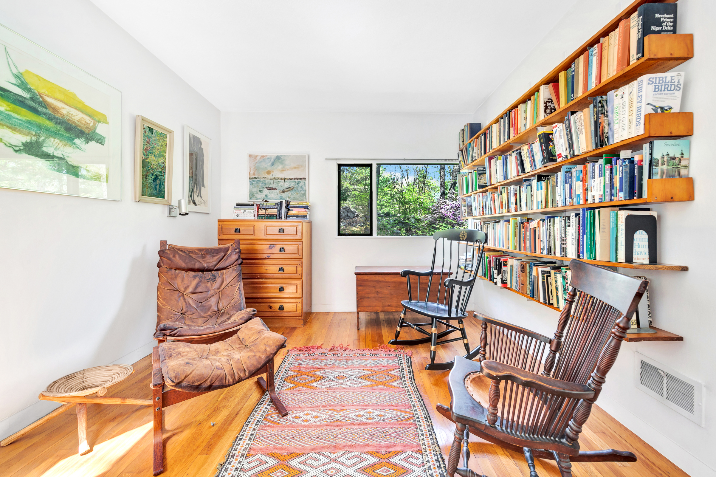 14 Barberry Road Lexington, MA 02421 - Photo 13 of 30 a living room with furniture a bookshelf and a window
