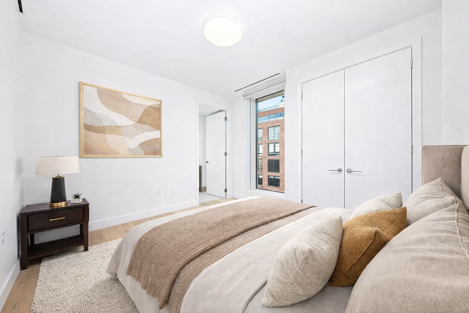 130 2nd Street, Unit TH1 Brooklyn, NY 11231 - Photo 9 of 23 a bedroom with a bed and a painting on the wall