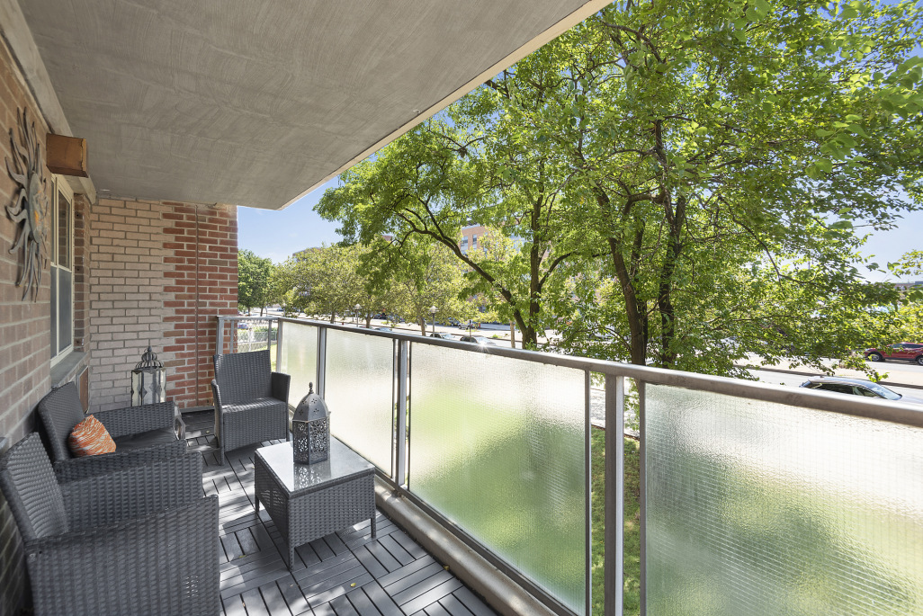 Brooklyn, NY 11207 - Photo 5 of 6 a balcony with chairs