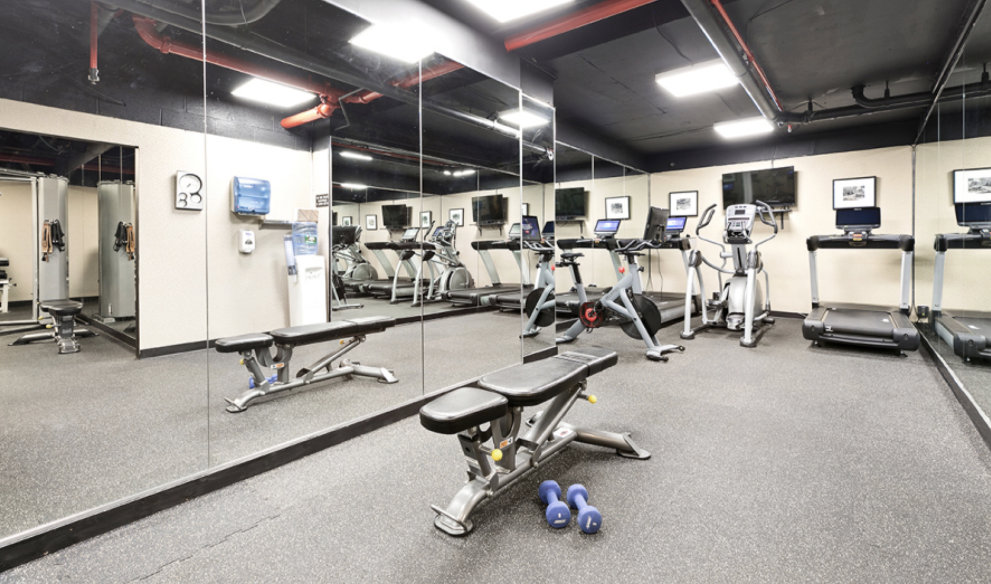 415 East 54th Street, Unit 6D Manhattan, NY 10022 - Photo 12 of 18 a view of a room with gym equipment