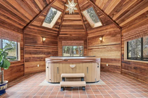 a patio with table and chairs