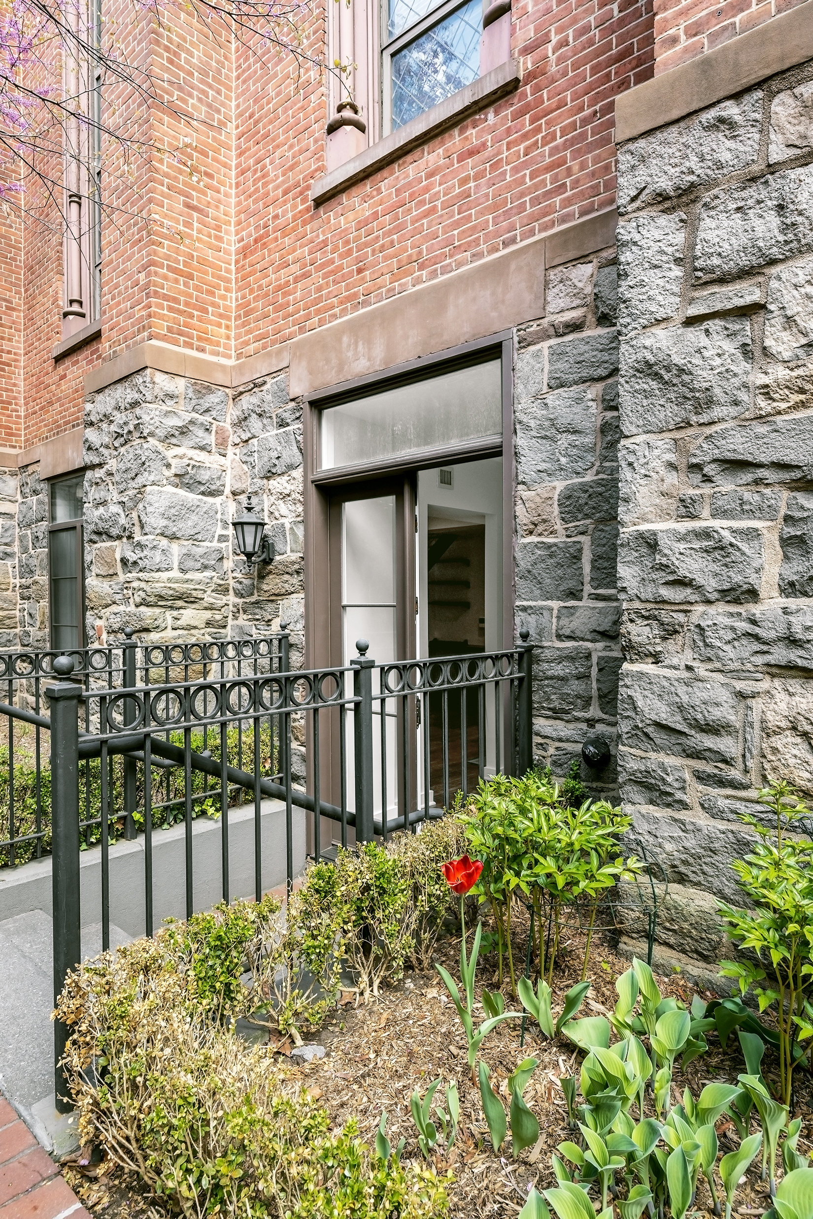 401 Hicks Street, Unit A1B Brooklyn, NY 11201 - Photo 13 of 14 a view of a pathway that has flowers in front of it
