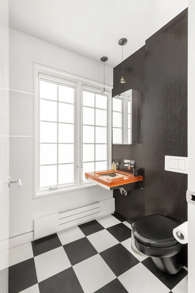 a black and white photo of a living room