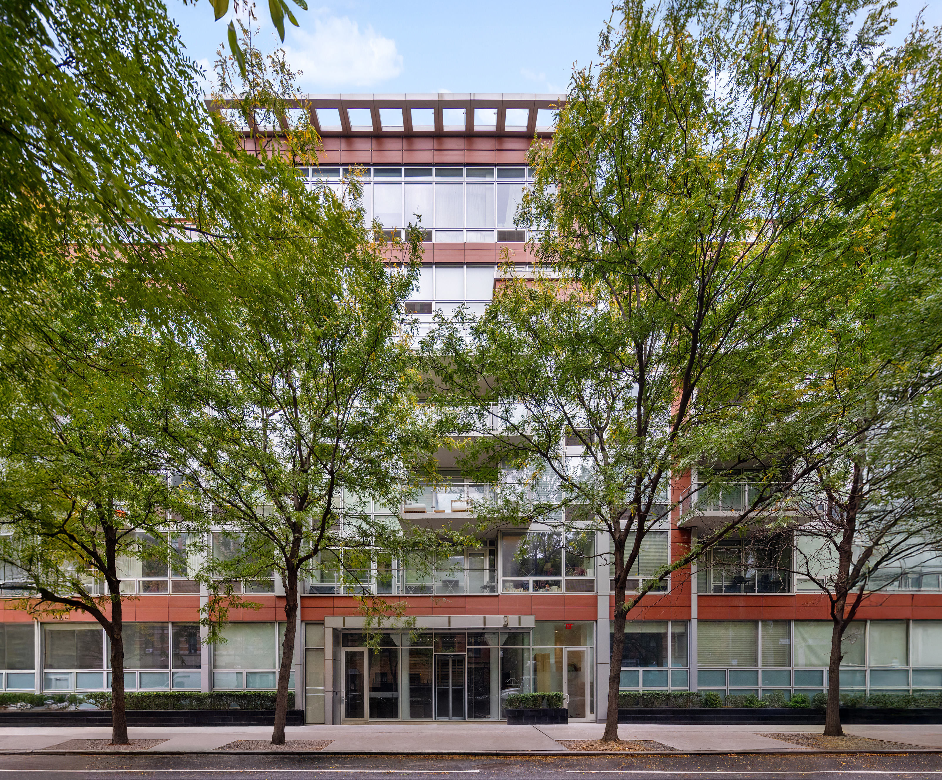 425 East 13th Street, Unit PHFG Manhattan, NY 10009 - Photo 30 of 31 a view of a building and trees