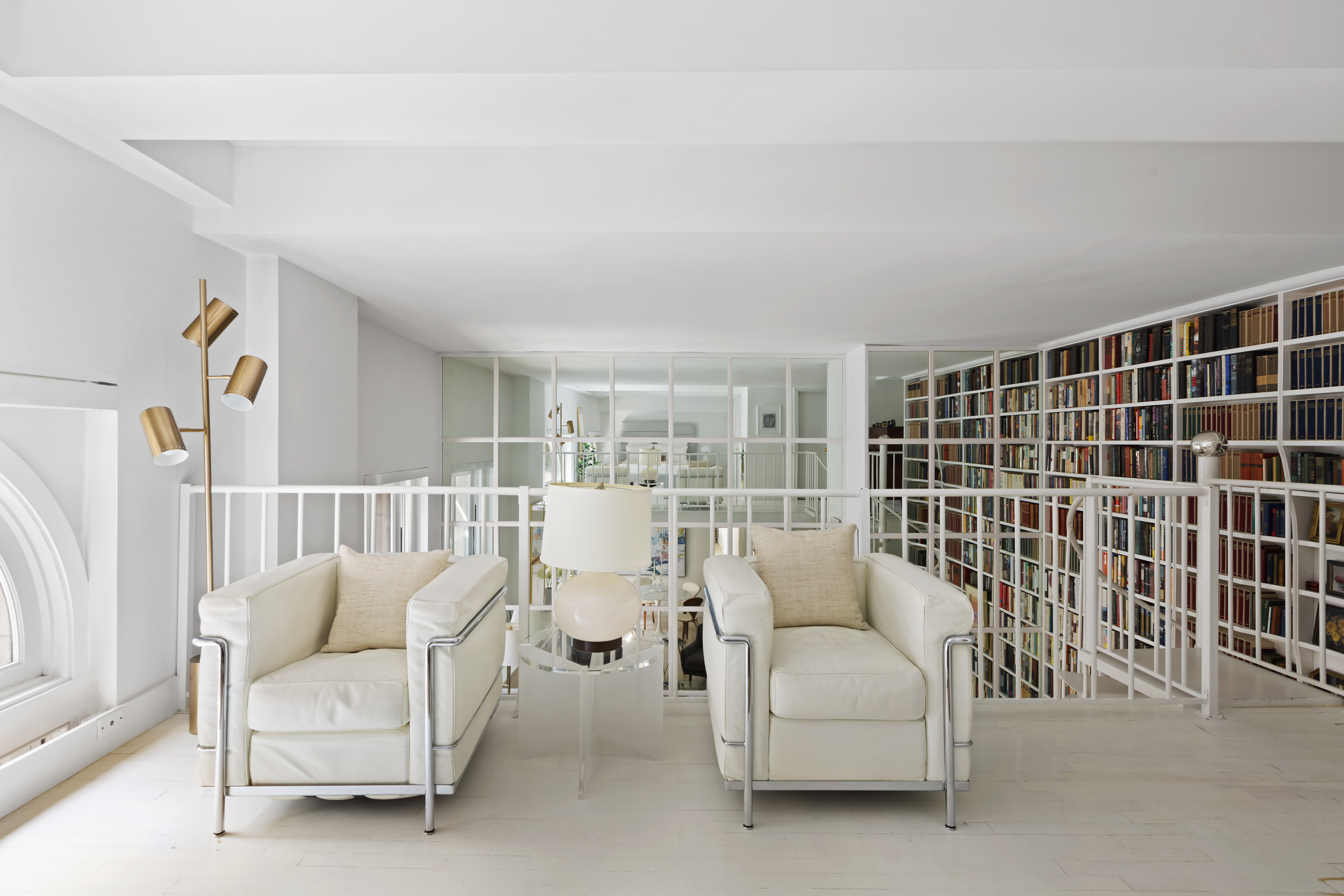 240 Centre Street, Unit 2J Manhattan, NY 10013 - Photo 13 of 18 a living room with furniture and white walls