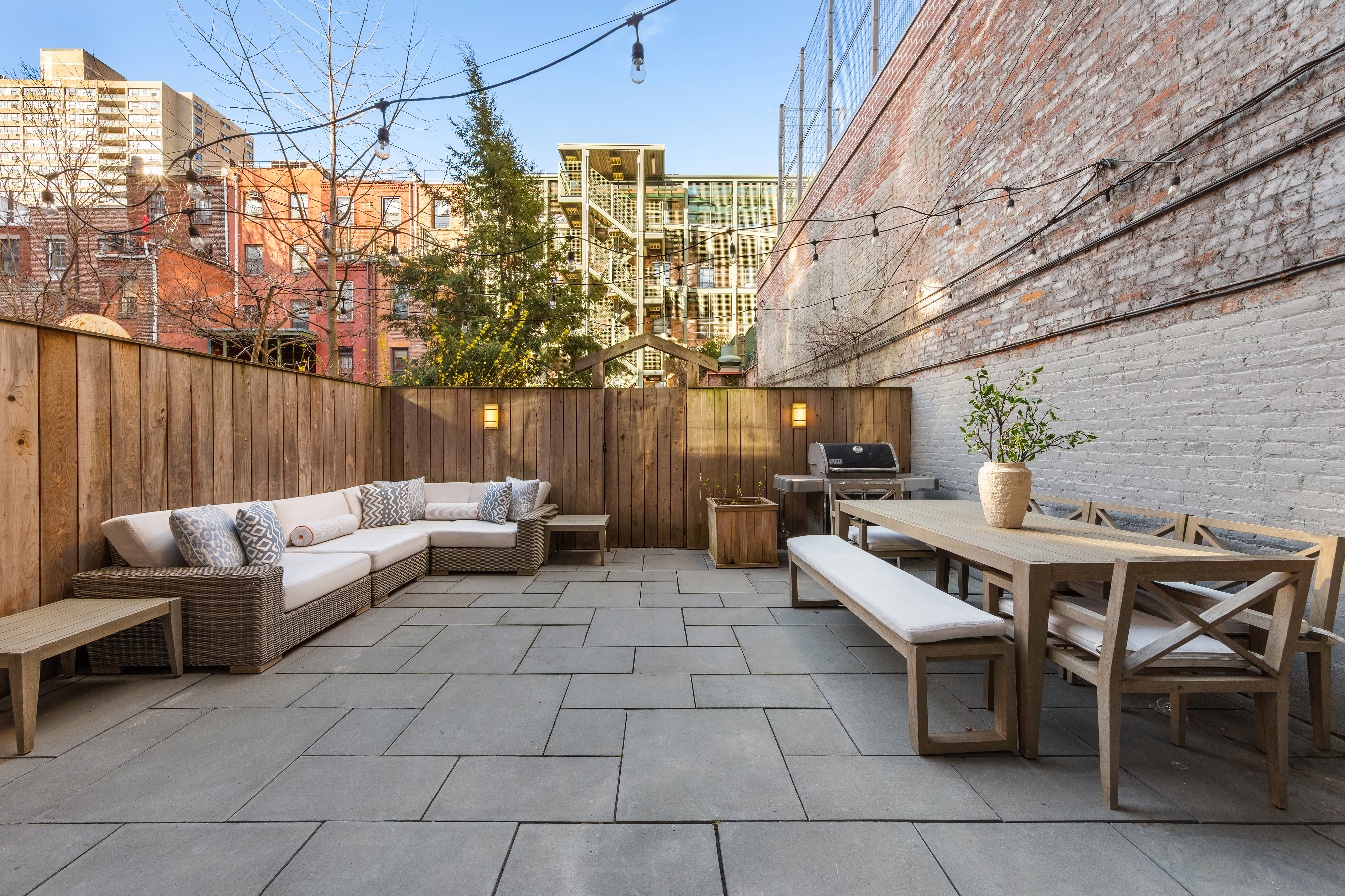 31 West 93rd Street, Unit 1D Manhattan, NY 10025 - Photo 4 of 18 a view of a patio with a table and chairs