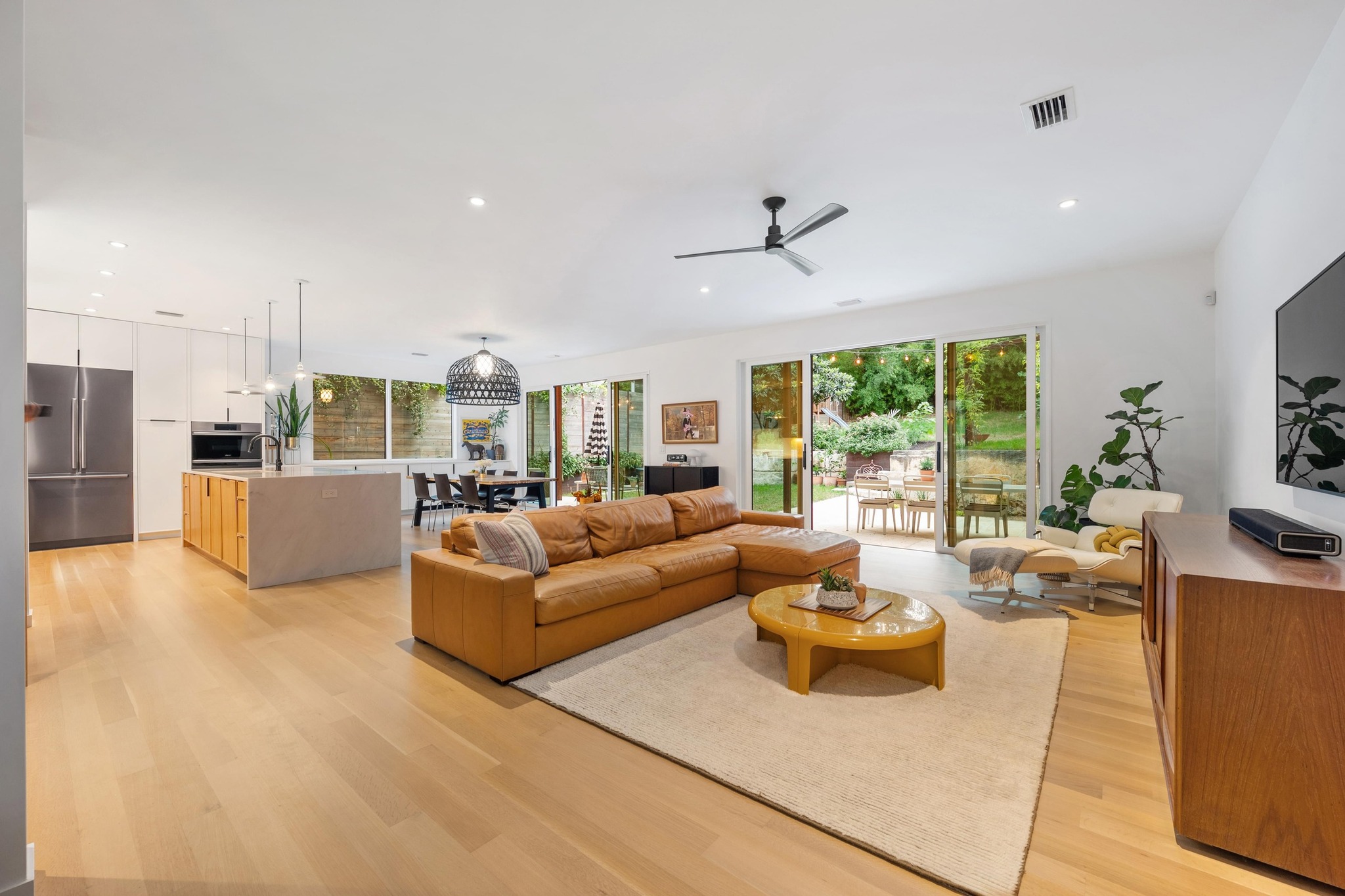 1206 Bickler Road Austin, TX 78704 - Photo 19 of 65 a living room with furniture and a large window