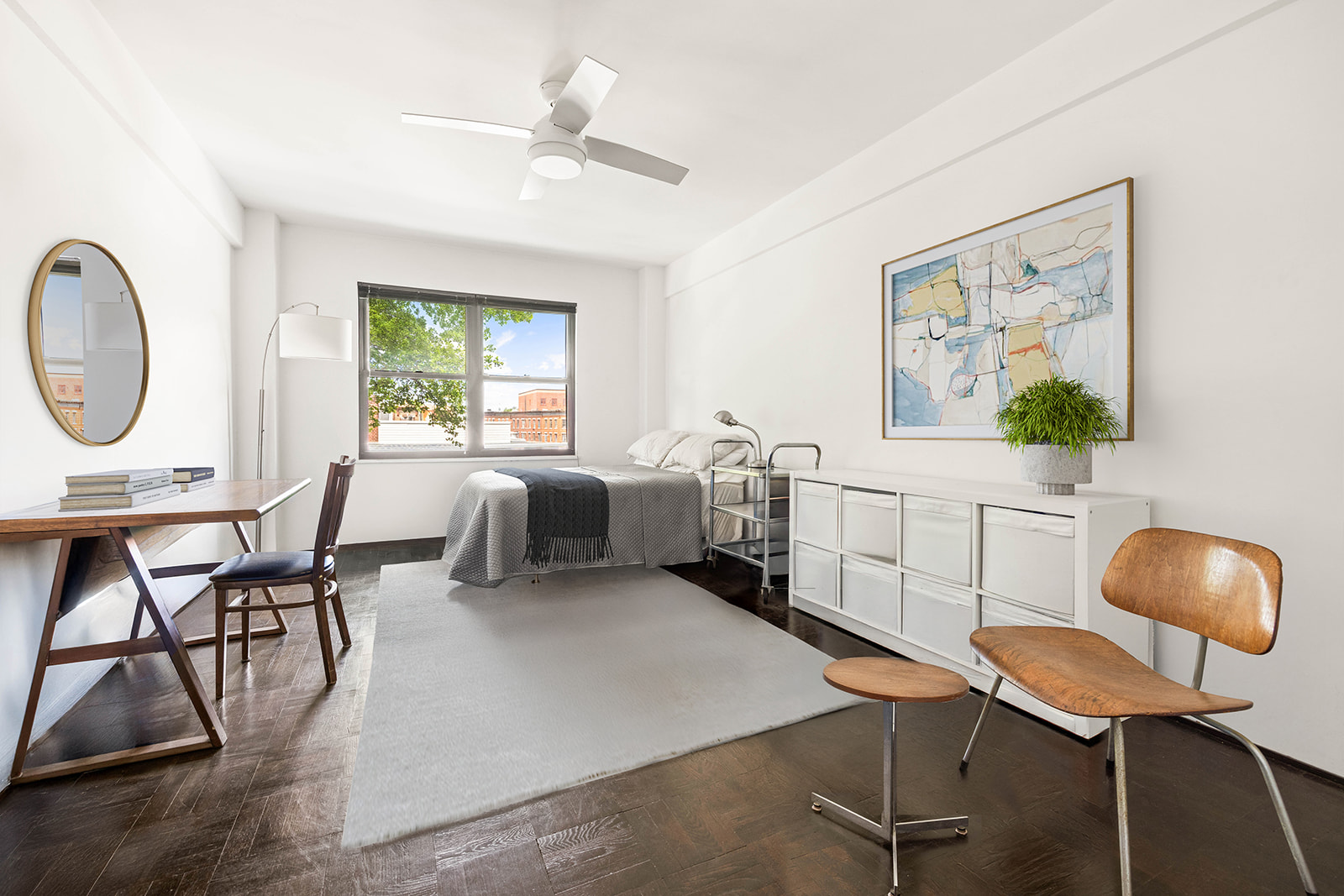 303 Beverley Road, Unit 3H Brooklyn, NY 11218 - Photo 7 of 11 a living room with furniture a window and a chandelier
