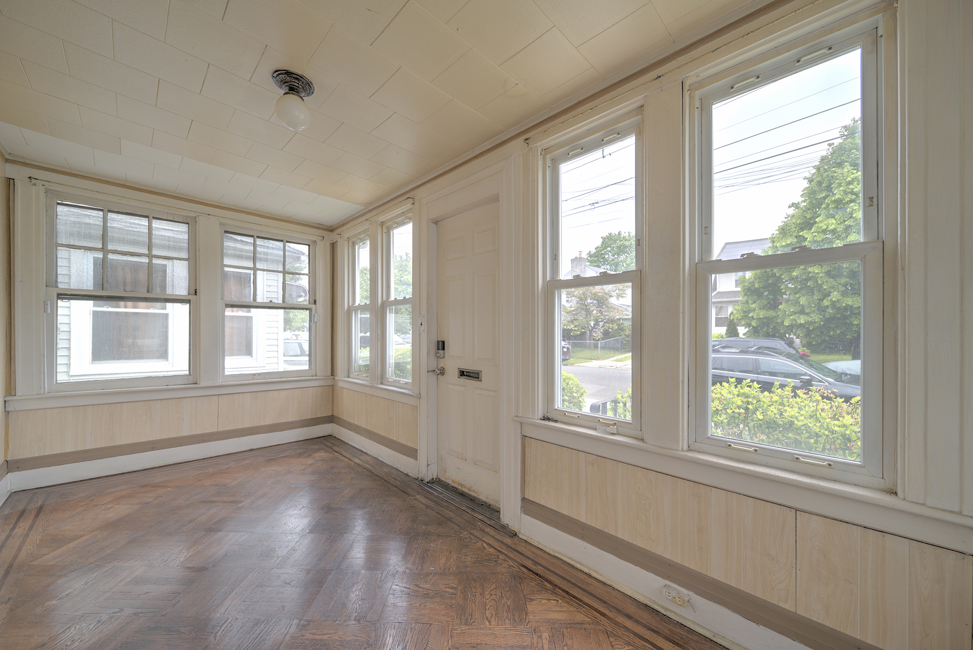 100-30 198th Street Queens, NY 11423 - Photo 5 of 15 a view of an empty room with a window