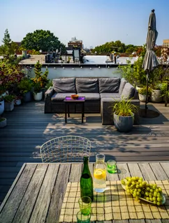 a view of a terrace with seating area