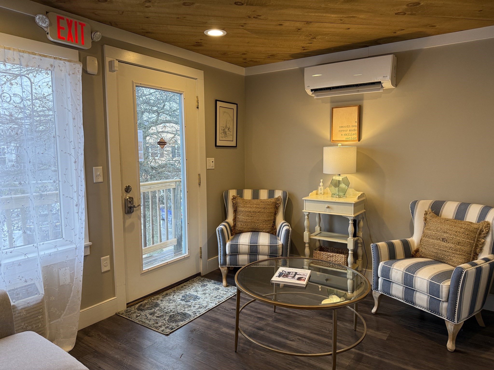 68 Tupper Road, Unit 8 Sandwich, MA 02563 - Photo 2 of 9 a living room with furniture and a window