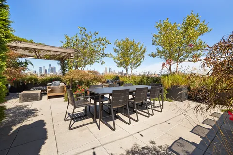 a view of a balcony with chairs