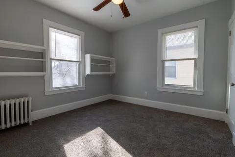 an empty room with windows