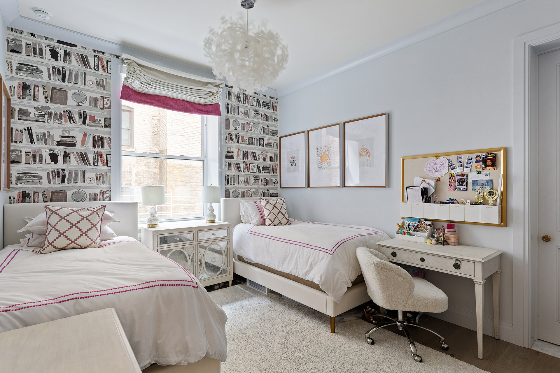 100 West 80th Street, Unit 5B Manhattan, NY 10024 - Photo 14 of 19 a bedroom with a bed and a chandelier