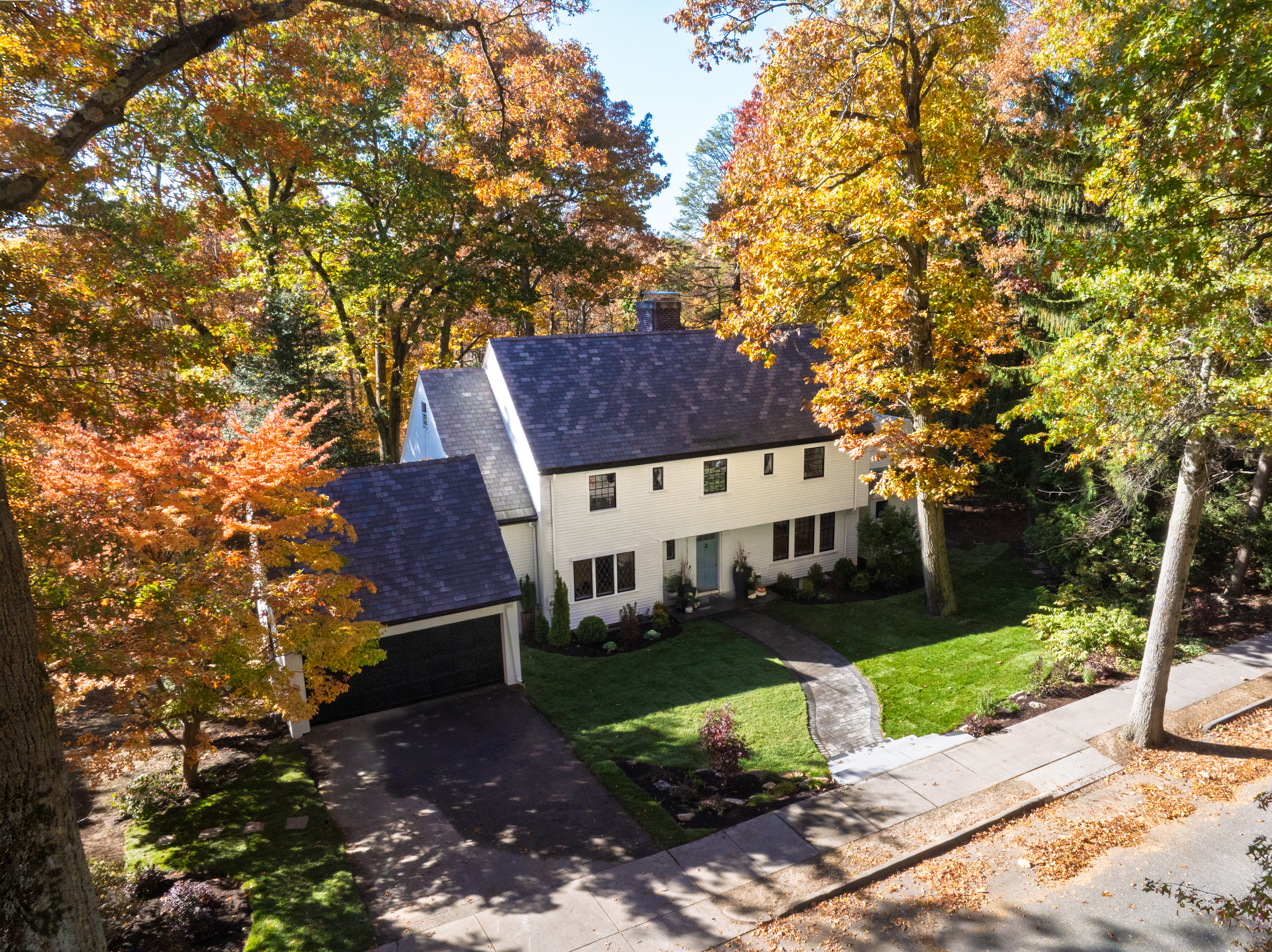 111 Beverly Road Brookline, MA 02467 - Photo 1 of 27 front view of a house with a yard