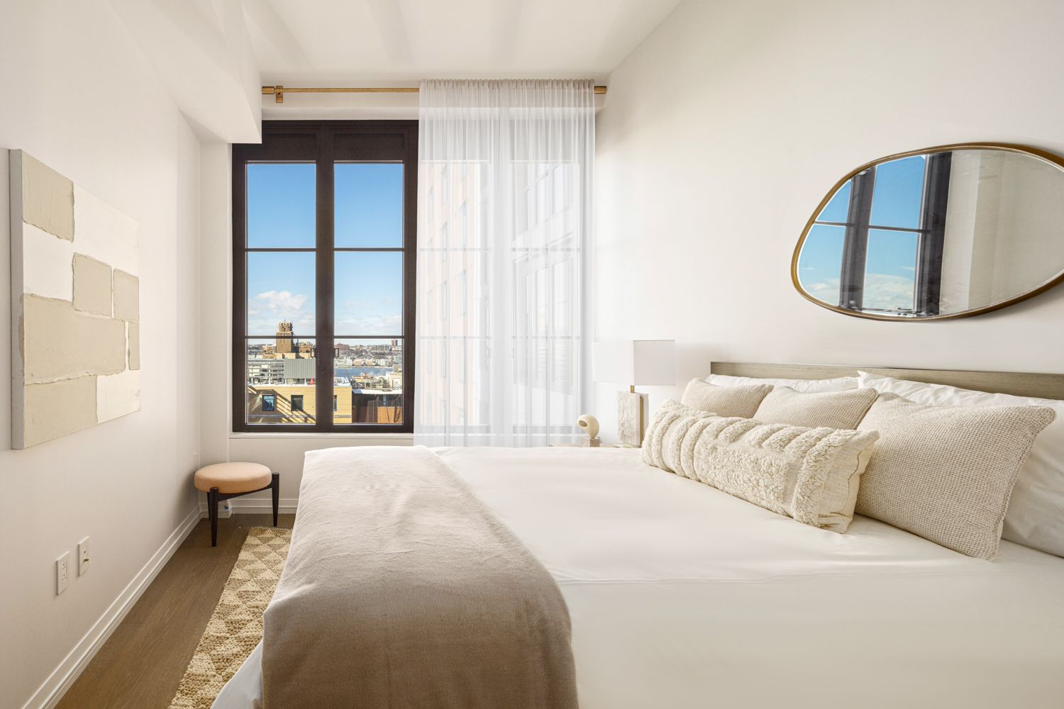 250 West 96th Street, Unit 22E Manhattan, NY 10025 - Photo 5 of 27 a bedroom with a bed and a large window