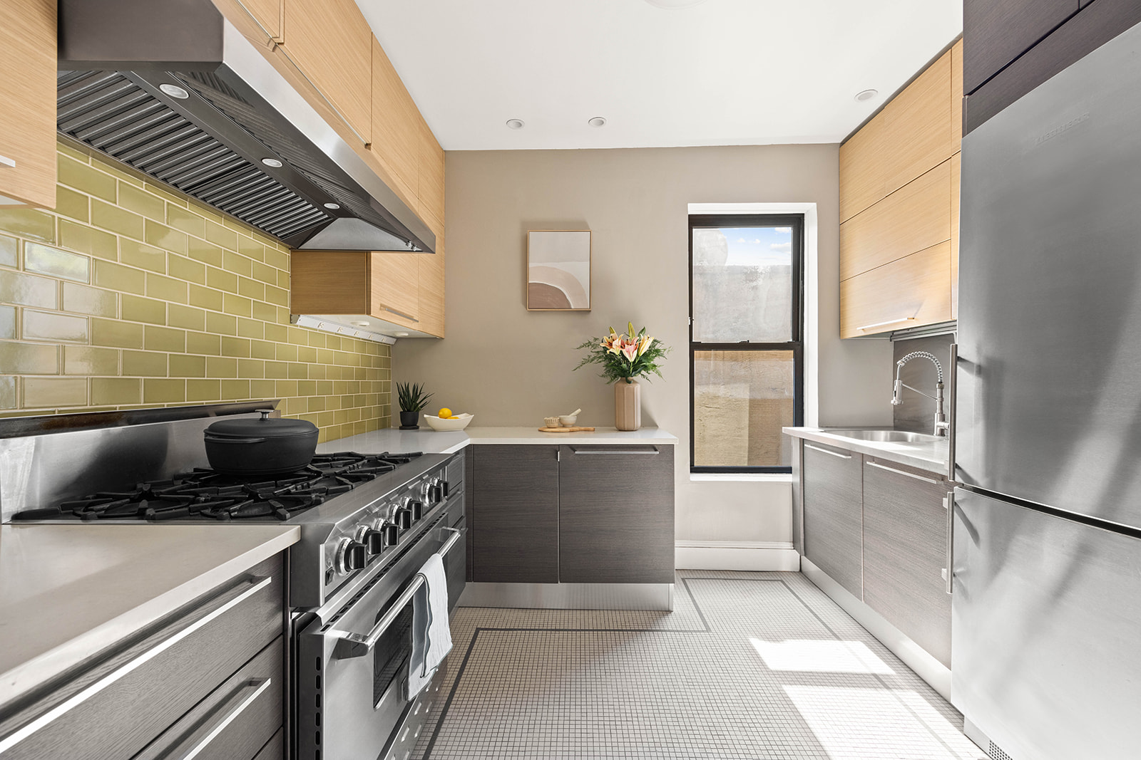 457 State Street, Unit 4BC Brooklyn, NY 11217 - Photo 4 of 13 a kitchen with a stove a sink and a refrigerator