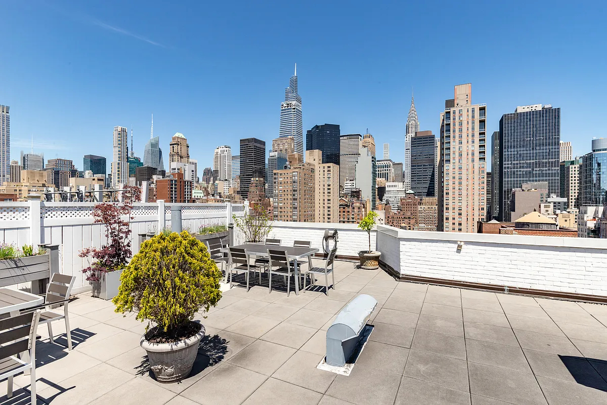 155 East 34th Street, Unit 6O Manhattan, NY 10016 - Photo 5 of 6 a view of roof deck with patio