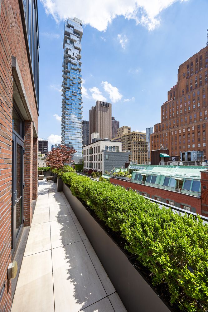 a view of a city with tall buildings