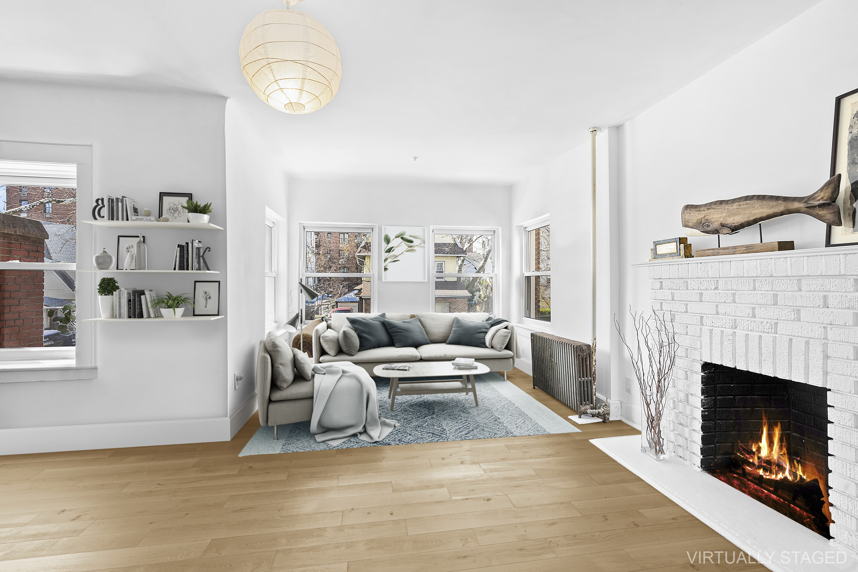 a living room with furniture and a fireplace