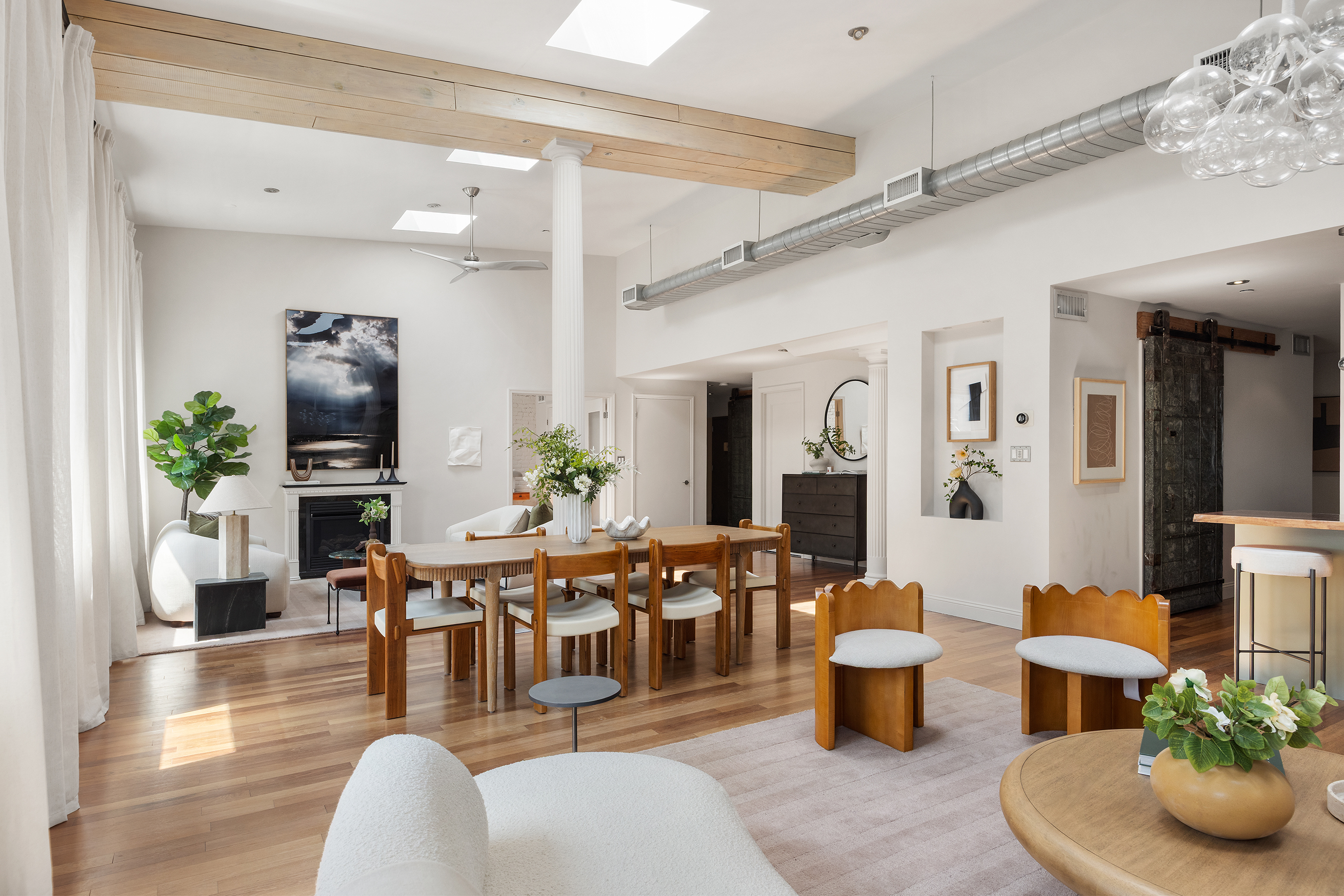 100 Reade Street, Unit 6CD Manhattan, NY 10013 - Photo 7 of 26 a living room with furniture potted plant and kitchen view