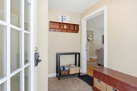 a room with furniture and a window