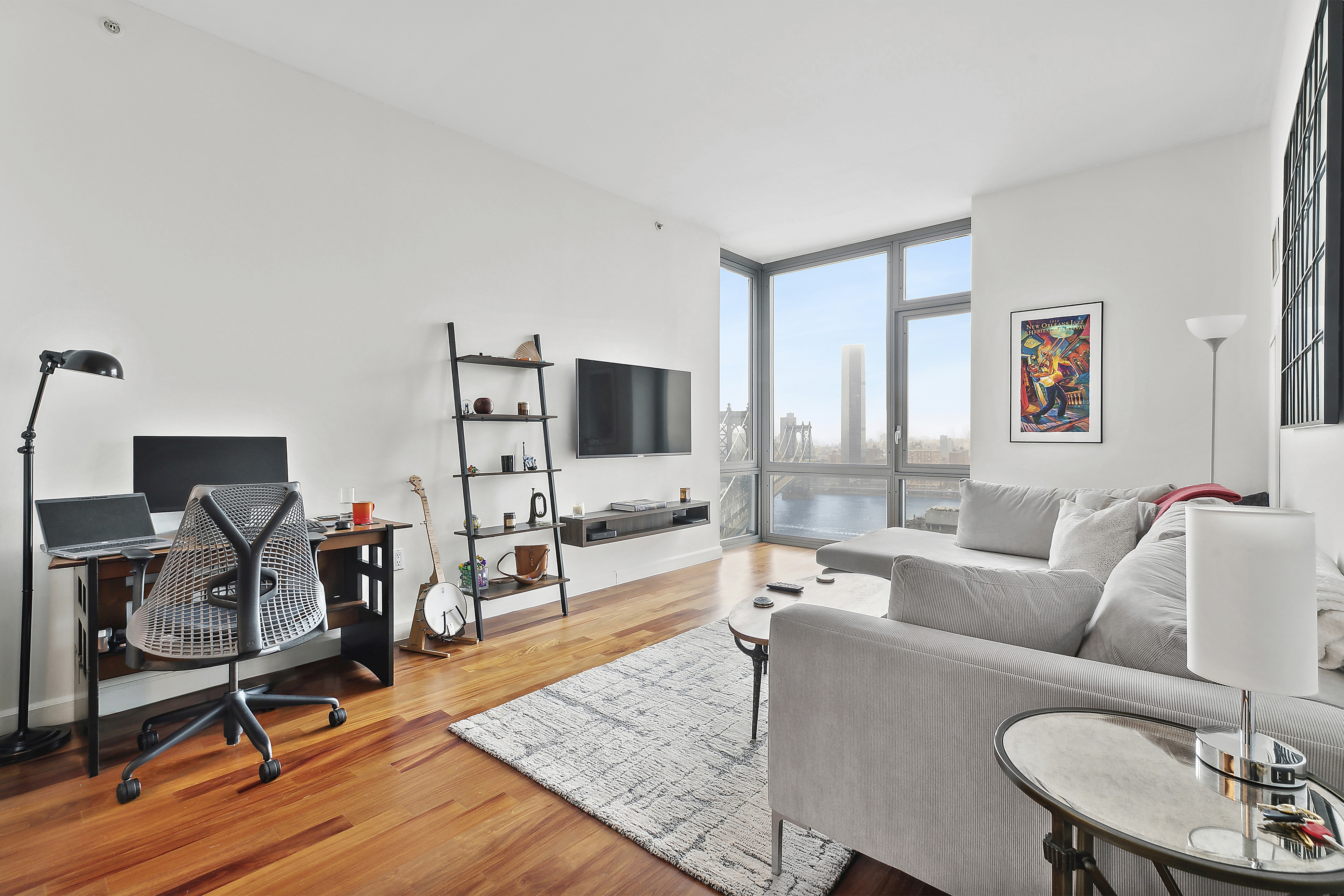 100 Jay Street, Unit 26B Brooklyn, NY 11201 - Photo 4 of 15 a living room with furniture and a flat screen tv
