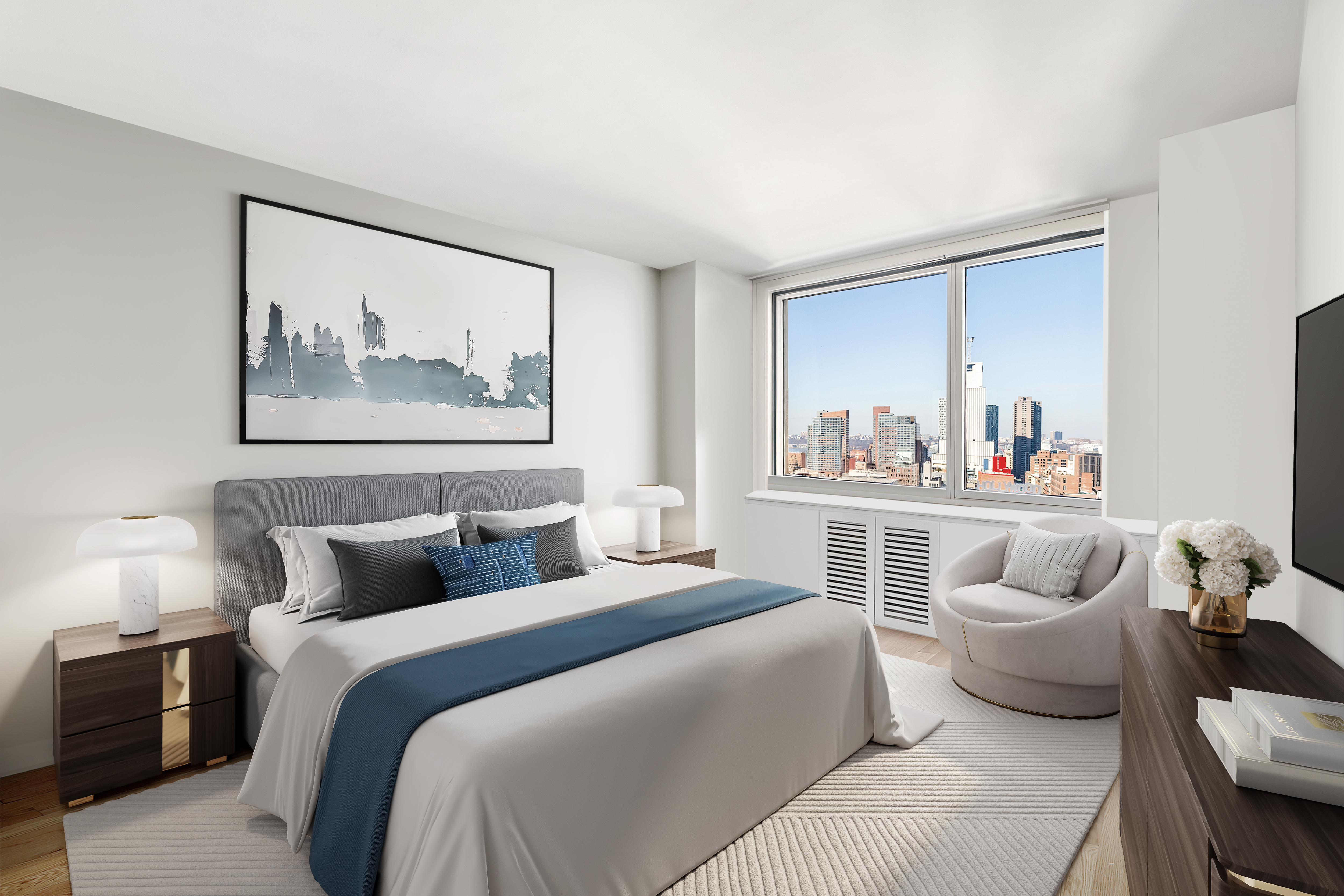 301 West 53rd Street, Unit 16D Manhattan, NY 10019 - Photo 3 of 16 a bedroom with a bed and wooden floor