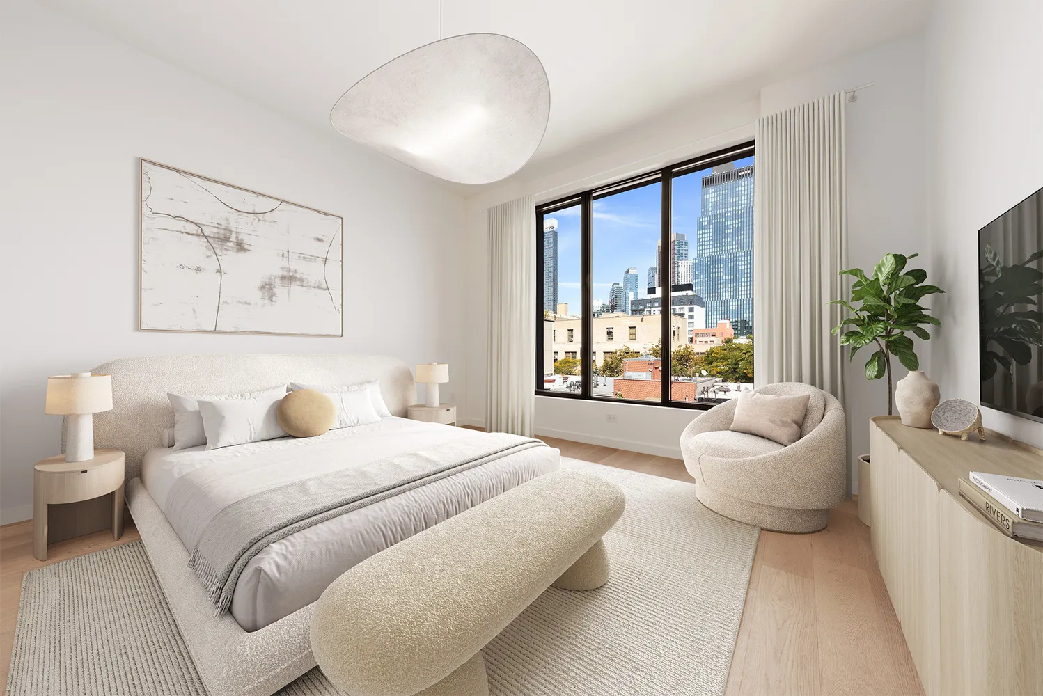 a spacious bedroom with a bed and a large window