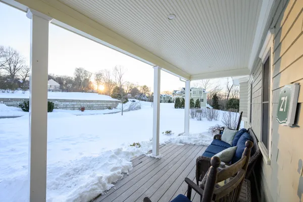 a view of balcony with furniture