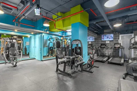 a view of a room with gym equipment